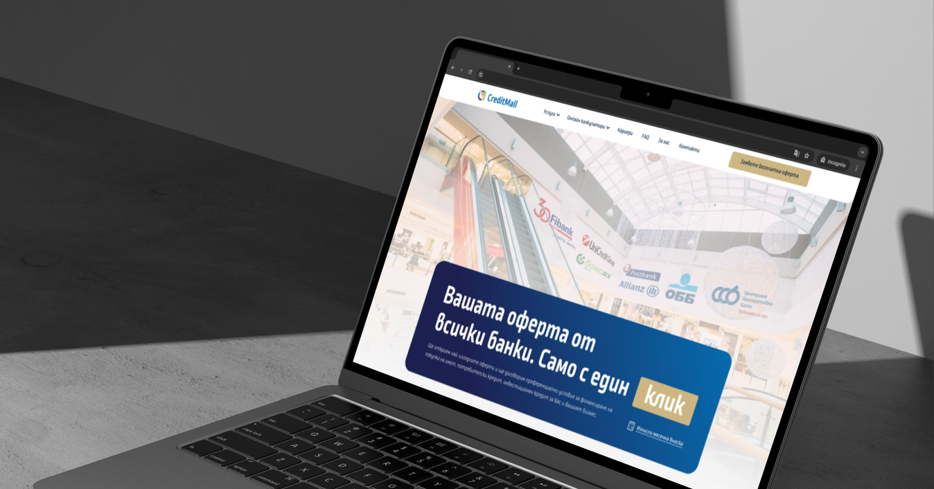 The CreditMall website on a laptop