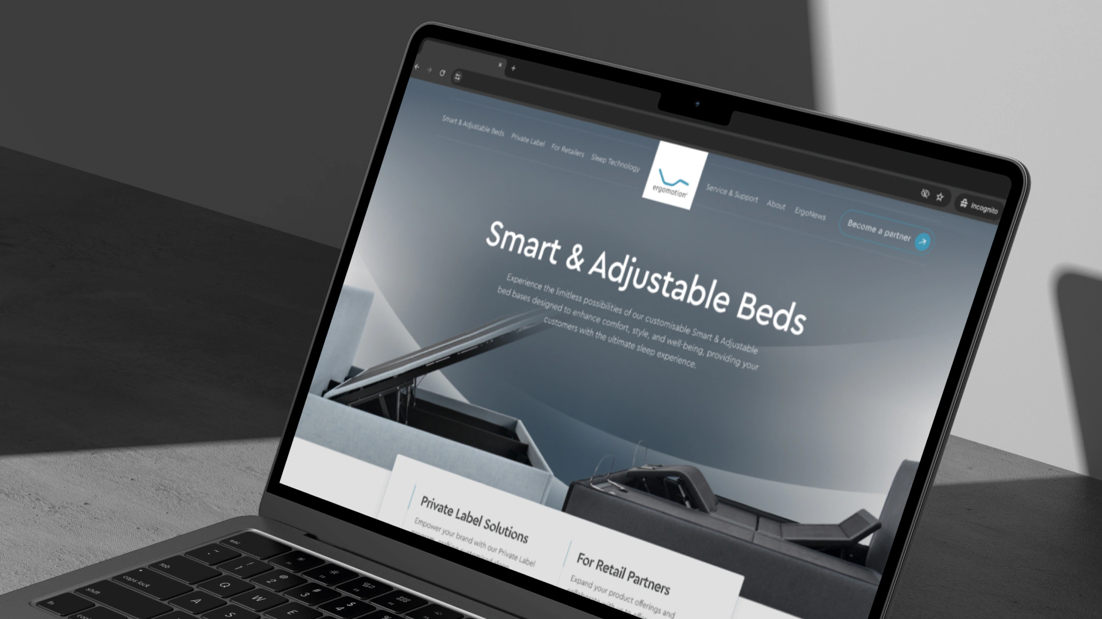 The Ergomotion website on a laptop