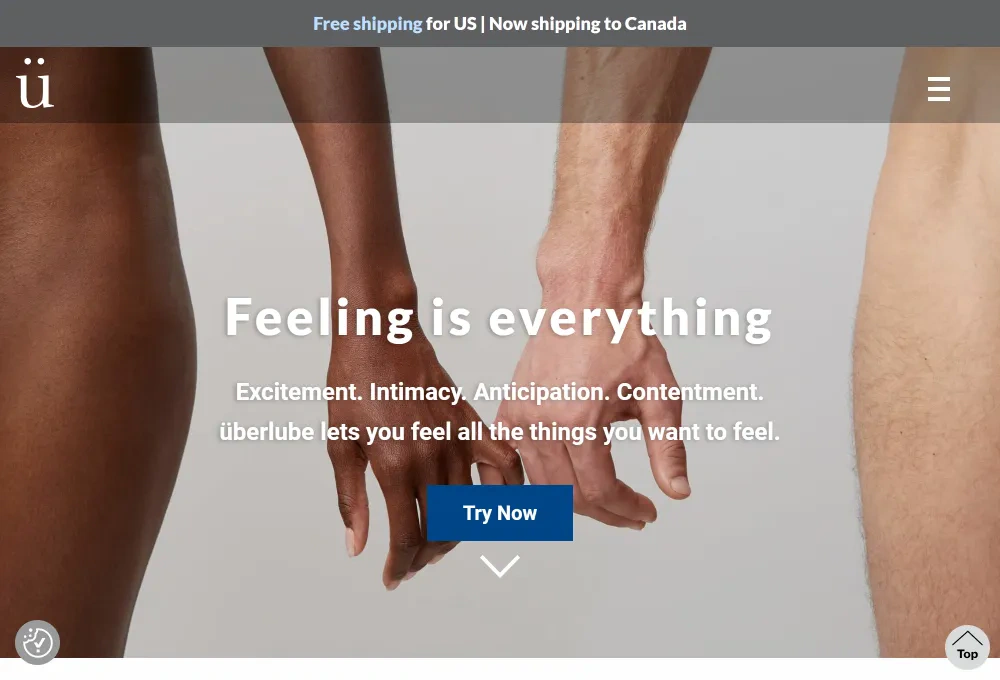 The Überlube homepage before the redesign: a full-width photo of two hands with Feeling is everything and a Try Now button